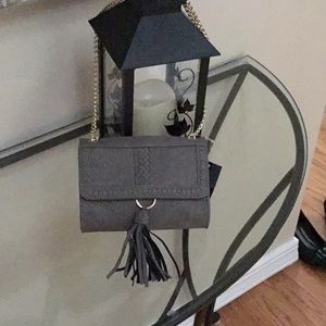Grey crossbody with gold chain. New with tag.